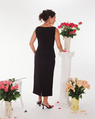 Back view of Simone sleeveless black slit dress